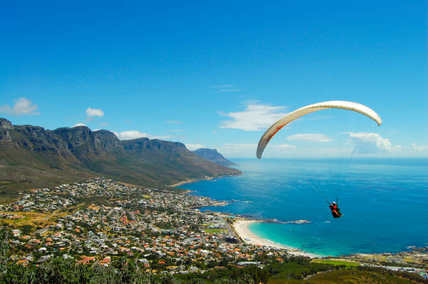 Paragliding over Camps Bay beach Cape Town