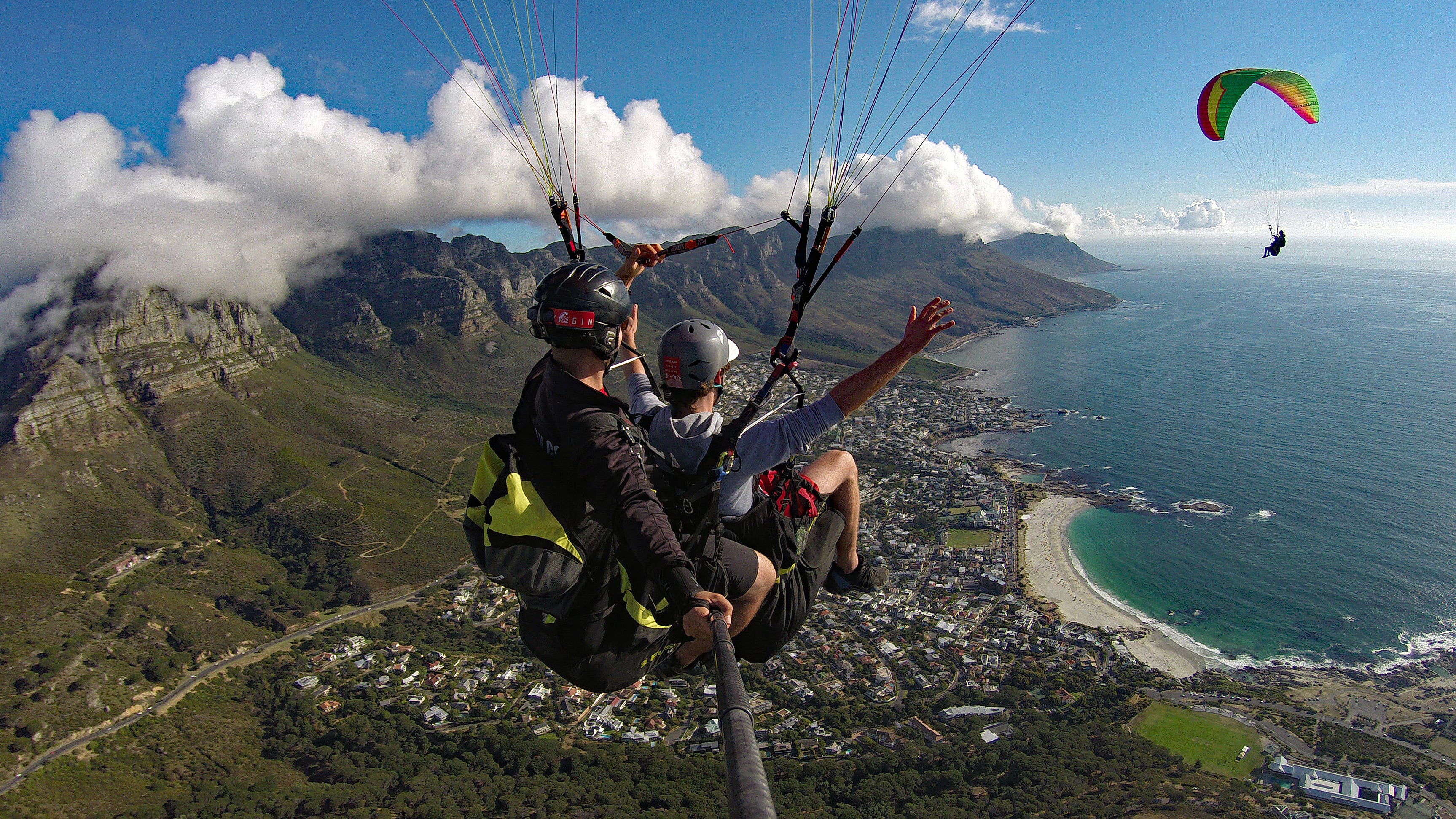 Paragliding landing on beach Cape Town