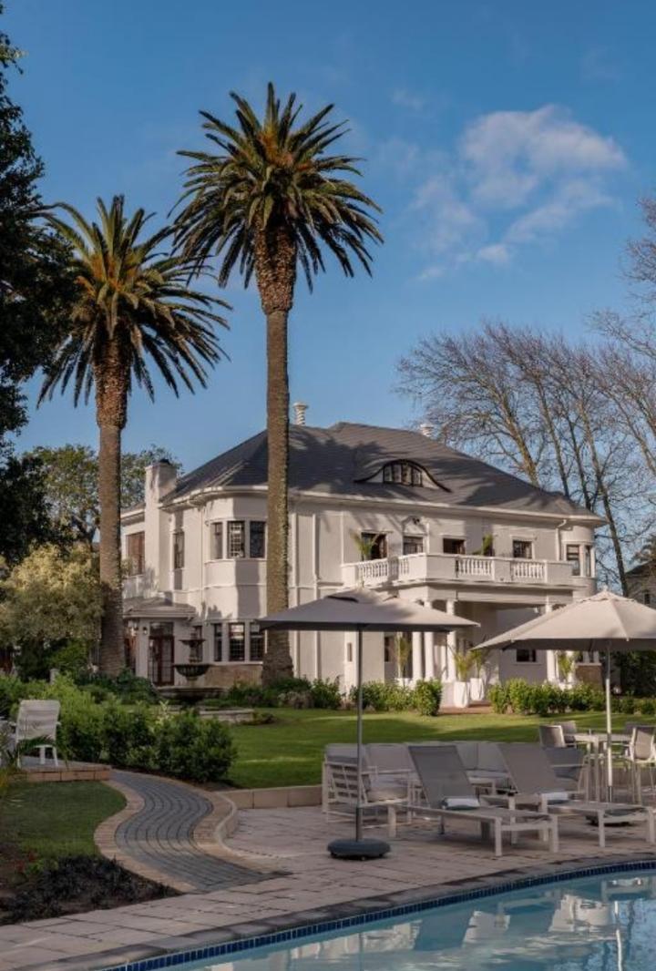 Luxury Castle — Garden Pool with Umbrellas