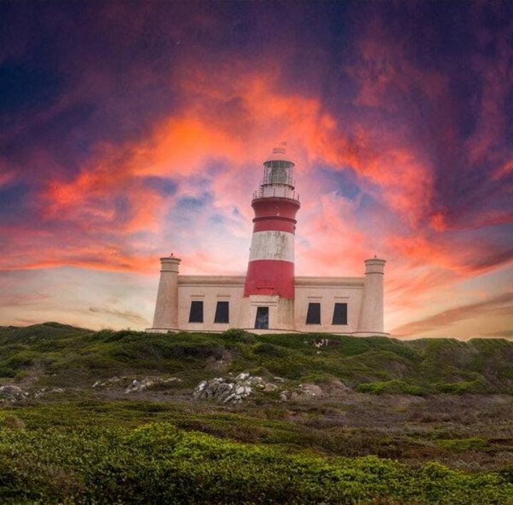 Fiery Sunset Over the Lighthouse